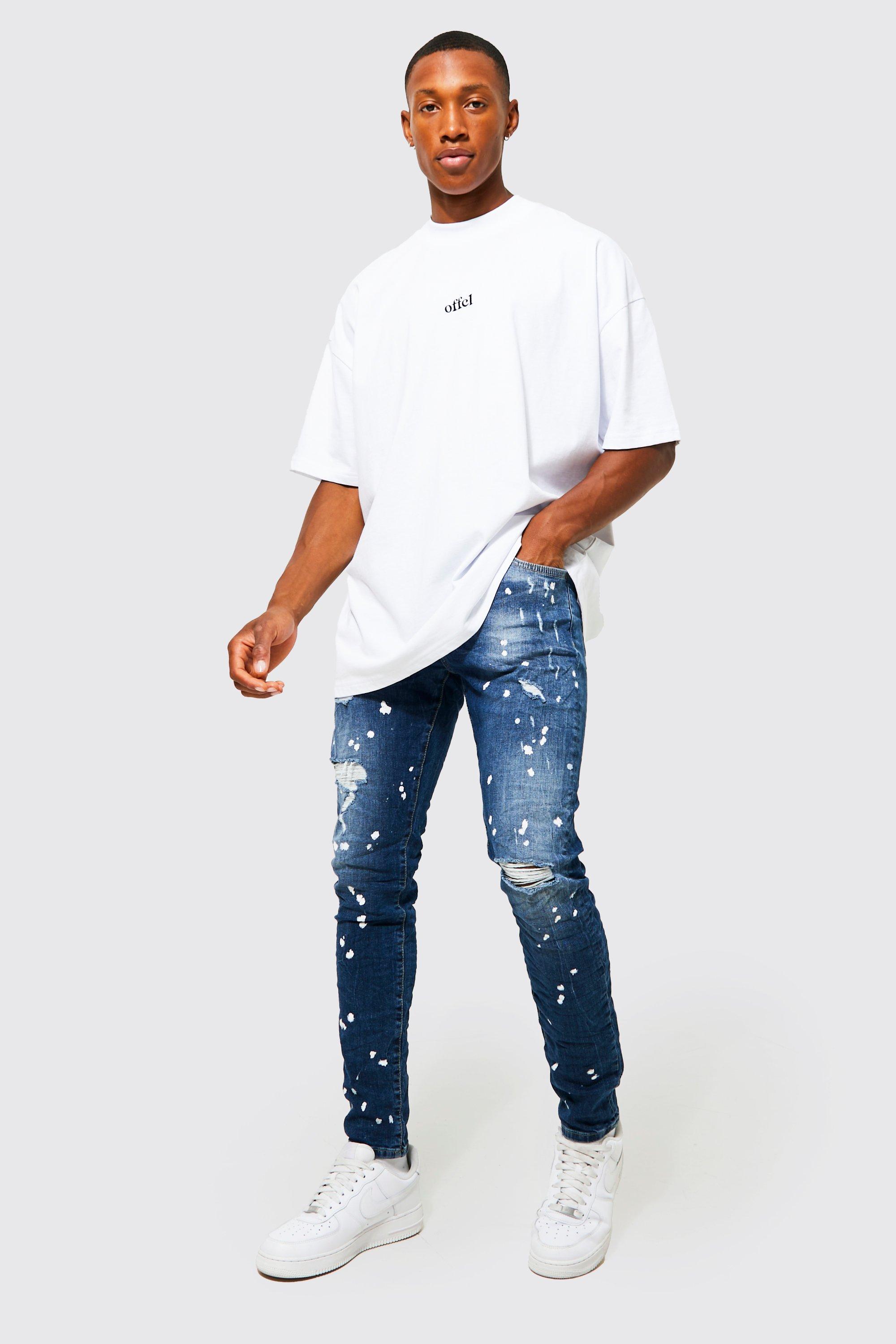 Jean skinny dechire a taches de peinture boohoo FR